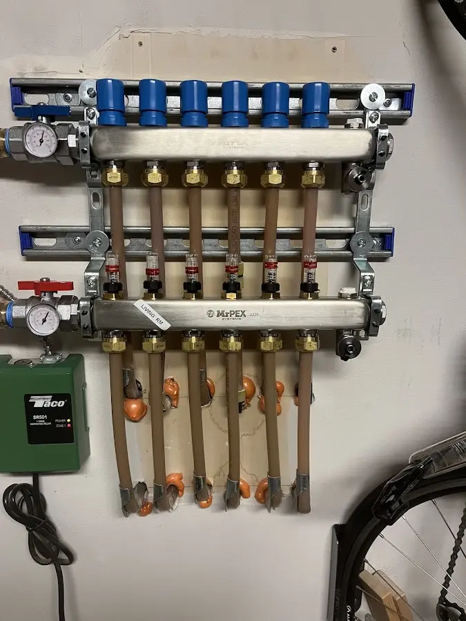 Plumber performing Water Heater Repair at a residential property in Seymour